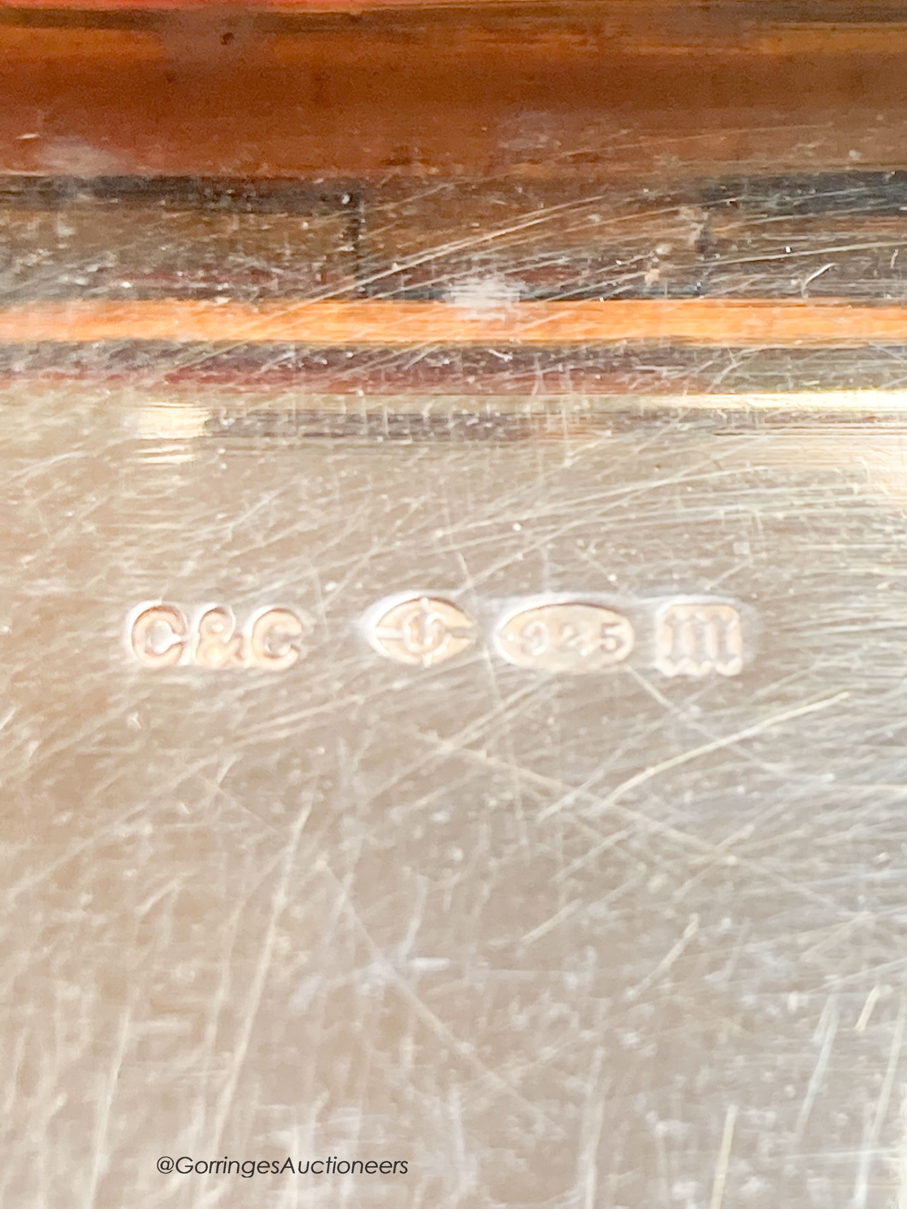 A 1920's continental silver and green guilloche enamel rectangular box and hinged cover, import marks for Cohen & Charles, London, 1927, 79mm by 54mm by 10mm